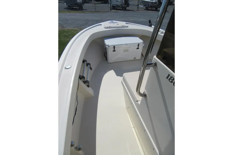Slide: The Image of 2003 Parker 1801 Center Console boat interior with cooler and railing. - 17