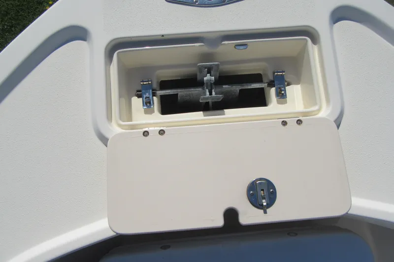 Slide: The Image of Anchor storage compartment on a 2003 Parker 1801 Center Console boat. - 19