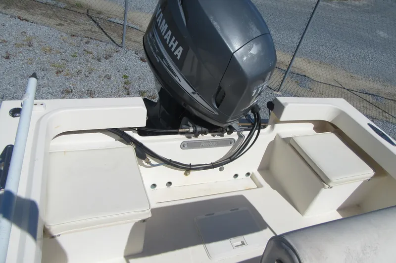 Slide: The Image of 2003 Parker 1801 Center Console boat with Yamaha outboard motor, rear seating view. - 21