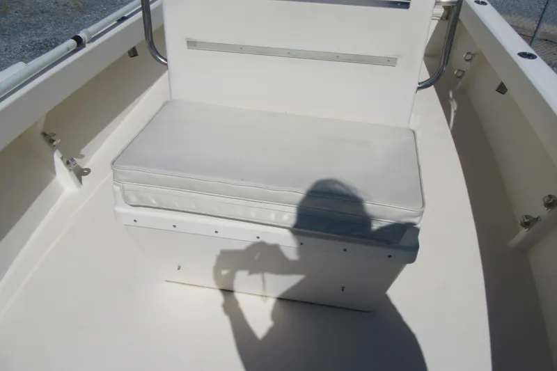 Slide: The Image of 2003 Parker 1801 Center Console boat seat with shadow on deck. - 24