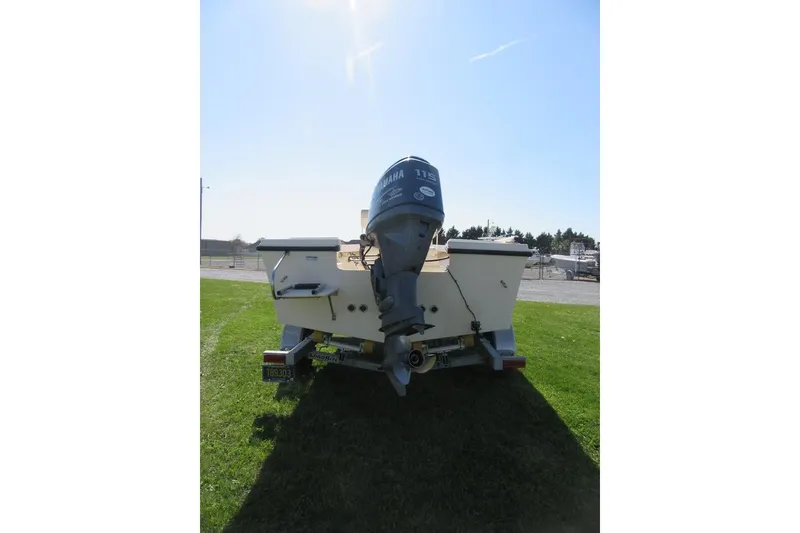 Slide: The Image of 2003 Parker 1801 Center Console boat on trailer, rear view, sunny day. - 3