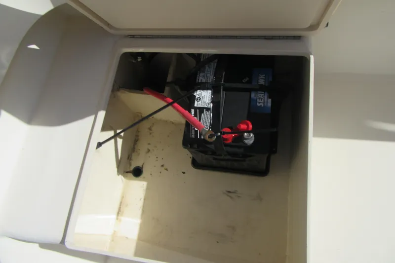 Slide: The Image of Battery compartment of a 2003 Parker 1801 Center Console boat. - 6