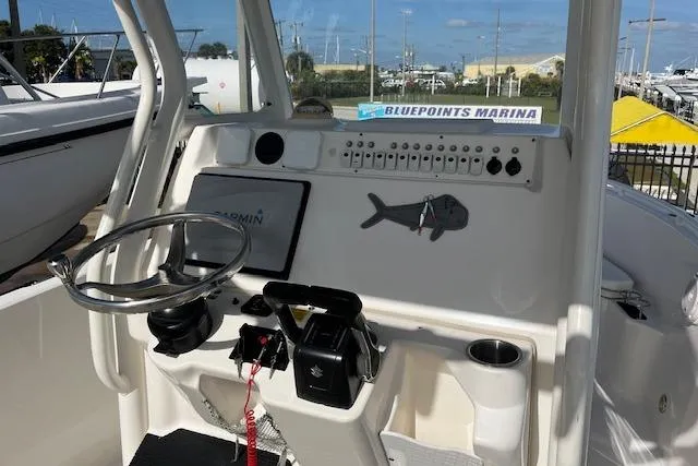 Slide: The Image of 2007 Everglades 240 Center Console boat dashboard at Bluepoints Marina. - 4