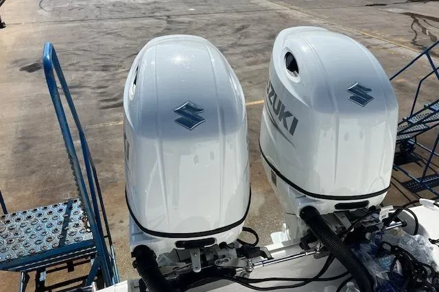 Slide: The Image of Twin Suzuki outboard engines on a 2007 Everglades 240 Center Console boat. - 6