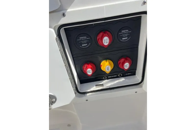 Slide: The Image of Control panel on a 2007 Everglades 240 Center Console boat. - 7