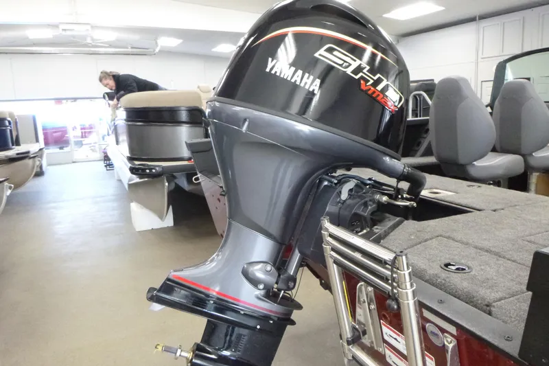 Slide: The Image of 2024 Alumacraft Competitor FSX 175 with Yamaha VMAX outboard motor in showroom. - 14