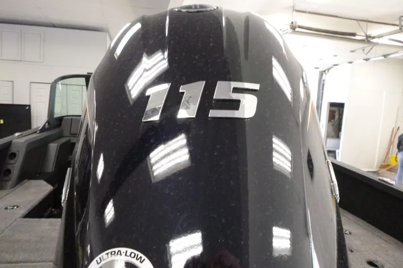 Slide: The Image of 2024 Alumacraft Competitor FSX 175 boat engine with "115" horsepower marking. - 15
