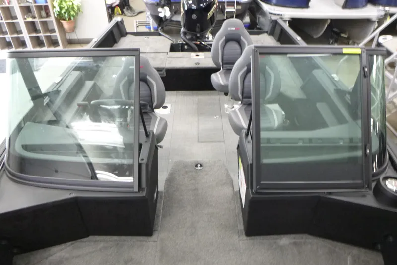 Slide: The Image of 2024 Alumacraft Competitor FSX 175 interior with dual seats and windshield. - 5