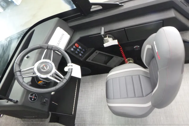 Slide: The Image of 2024 Alumacraft Competitor FSX 175 cockpit with steering wheel and seat. - 8