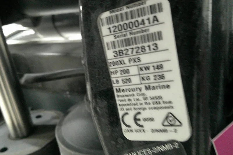 Slide: The Image of Label on Mercury Marine engine with serial number and specifications, Tahoe T21, 2023 model. - 10