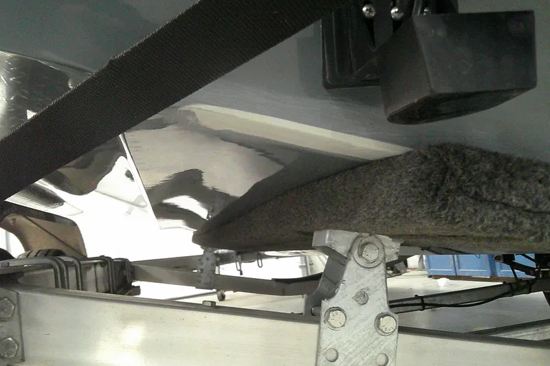 Slide: The Image of 2023 Tahoe T21 boat trailer with support and securing strap. - 3