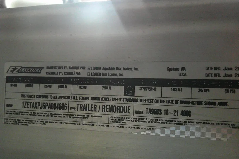 Slide: The Image of Label on EZ Loader trailer, model TA96BS 18-21 4000, manufactured in Spokane, WA. - 4