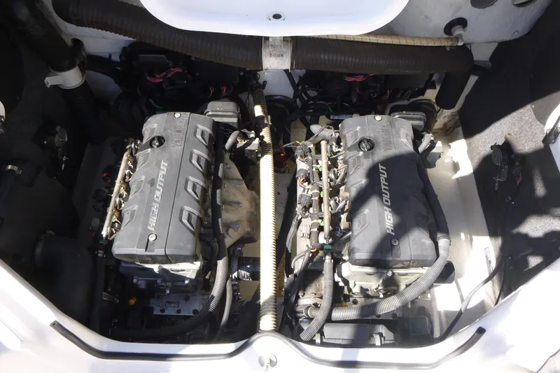 Slide: The Image of 2011 Yamaha Boats AR240 HO engine compartment with dual high output engines. - 14