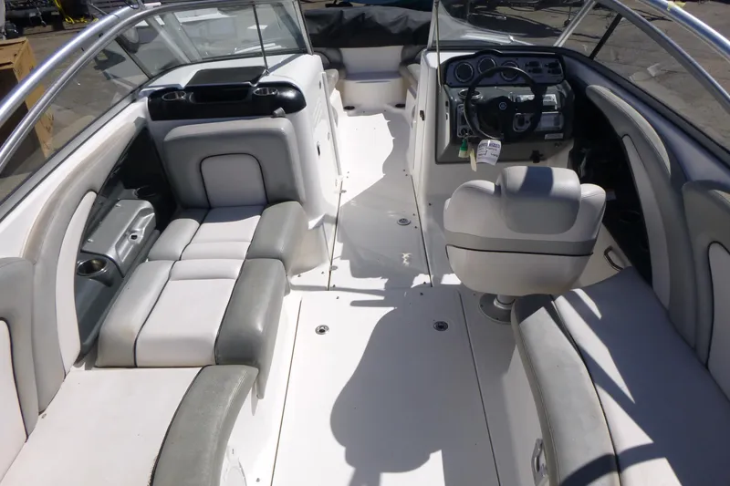 Slide: The Image of 2011 Yamaha Boats AR240 HO interior with seating and steering console. - 4
