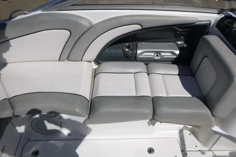 Slide: The Image of 2011 Yamaha Boats AR240 HO interior seating with gray and white upholstery. - 9