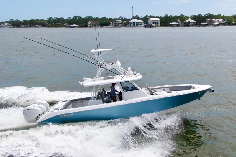 The Image of 2023 Everglades 395 Center Console boat cruising on open water. - 0