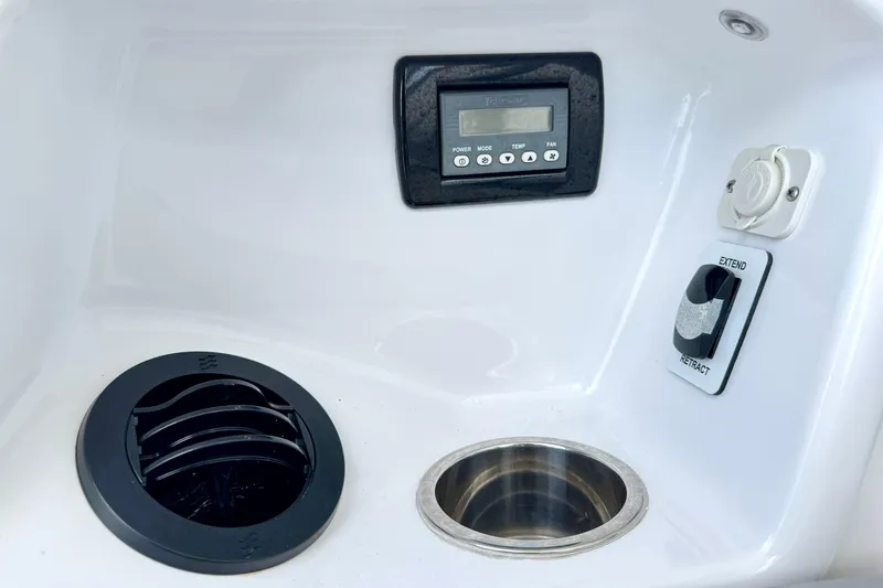 Slide: The Image of Control panel and vent on 2023 Everglades 395 Center Console boat. - 15
