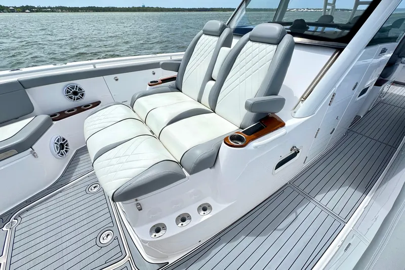 Slide: The Image of Luxury seating on 2023 Everglades 395 Center Console boat, featuring sleek design and comfort. - 34