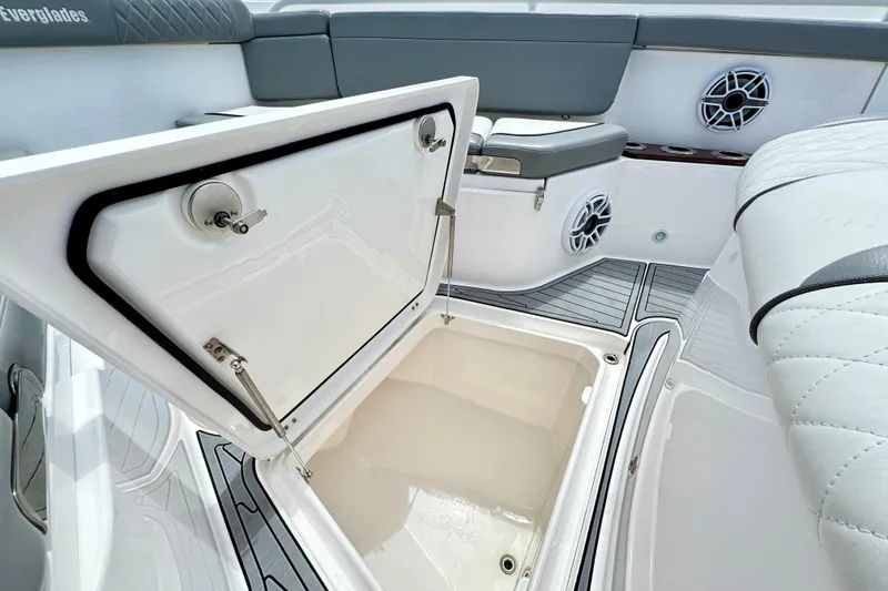 Slide: The Image of 2023 Everglades 395 Center Console boat interior with open storage compartment. - 43