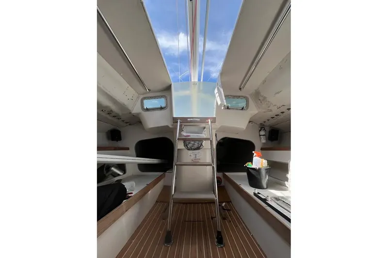 Slide: The Image of Interior view of 2001 J Boats J/105 sailboat cabin with ladder and skylight. - 9
