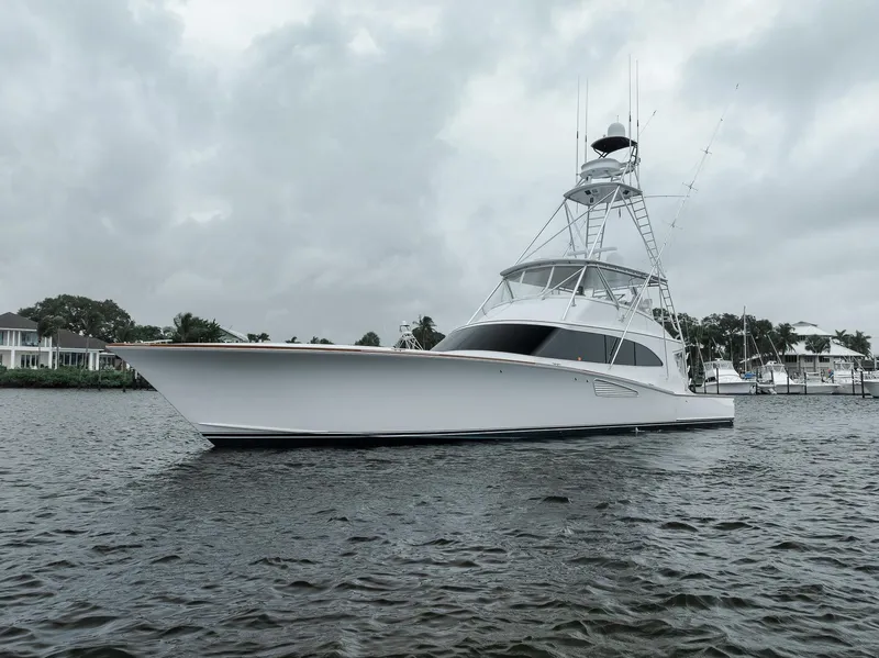 The Image of 2011 Jim Smith Custom Sportfish yacht on water under cloudy sky. - 0