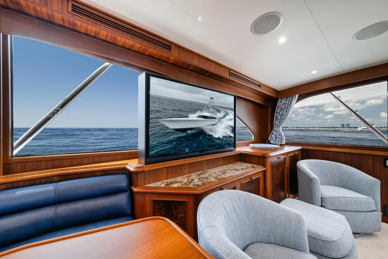 Slide: The Image of Luxurious interior of 2011 Jim Smith Custom Sportfish yacht with ocean view and elegant seating. - 25
