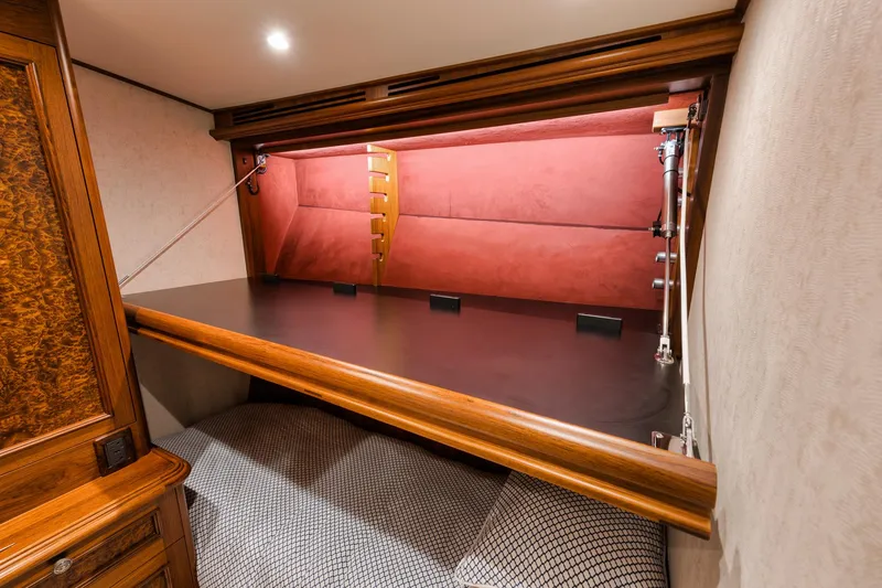 Slide: The Image of Luxurious interior of 2011 Jim Smith Custom Sportfish with elegant wood and upholstered details. - 47