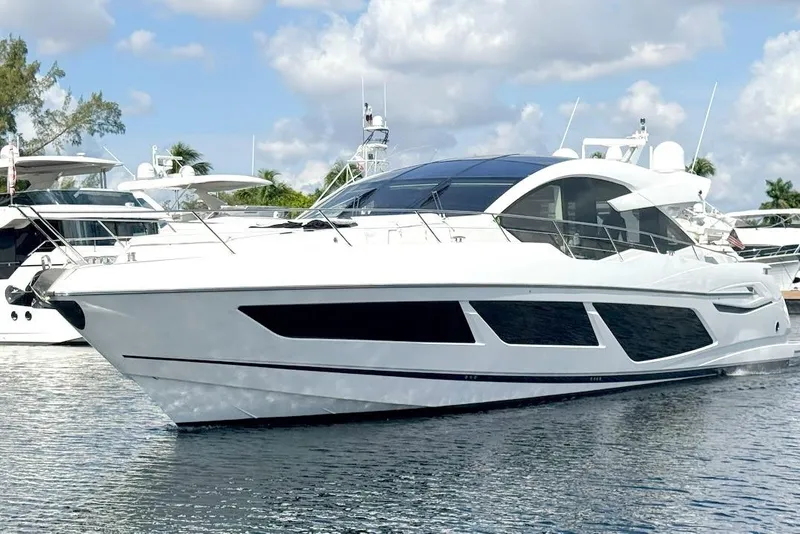 Slide: The Image of Luxury Sunseeker Predator 74 XPS yacht, 2020 model, docked on a sunny day. - 10