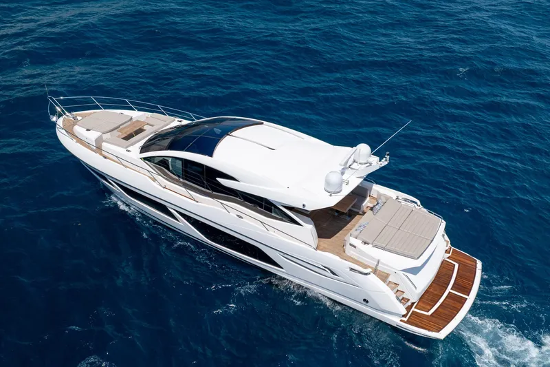 Slide: The Image of 2020 Sunseeker Predator 74 XPS luxury yacht cruising on open blue sea. - 109
