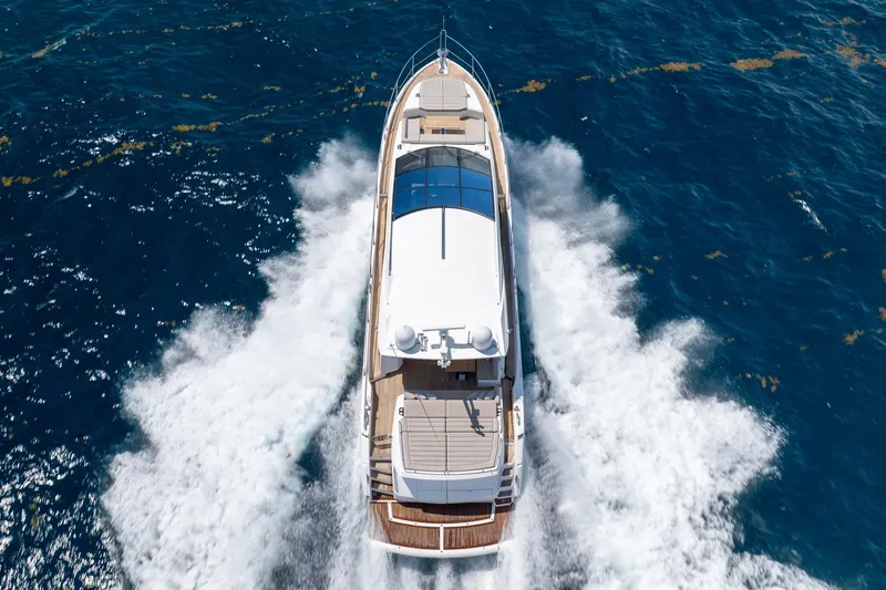 Slide: The Image of 2020 Sunseeker Predator 74 XPS yacht cruising on open blue sea. - 111
