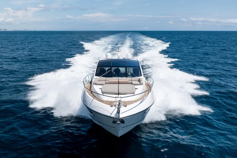 Slide: The Image of Sunseeker Predator 74 XPS 2020 yacht cruising on open sea, leaving a wake. - 121