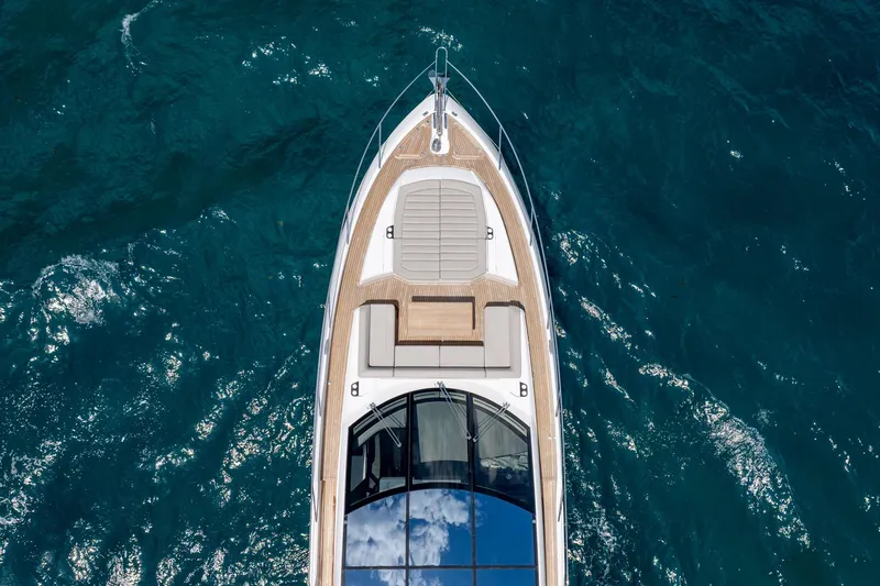 Slide: The Image of Aerial view of 2020 Sunseeker Predator 74 XPS yacht on blue ocean water. - 123