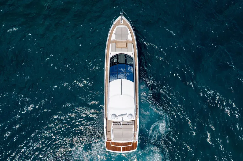 Slide: The Image of Aerial view of 2020 Sunseeker Predator 74 XPS yacht cruising in blue ocean waters. - 124
