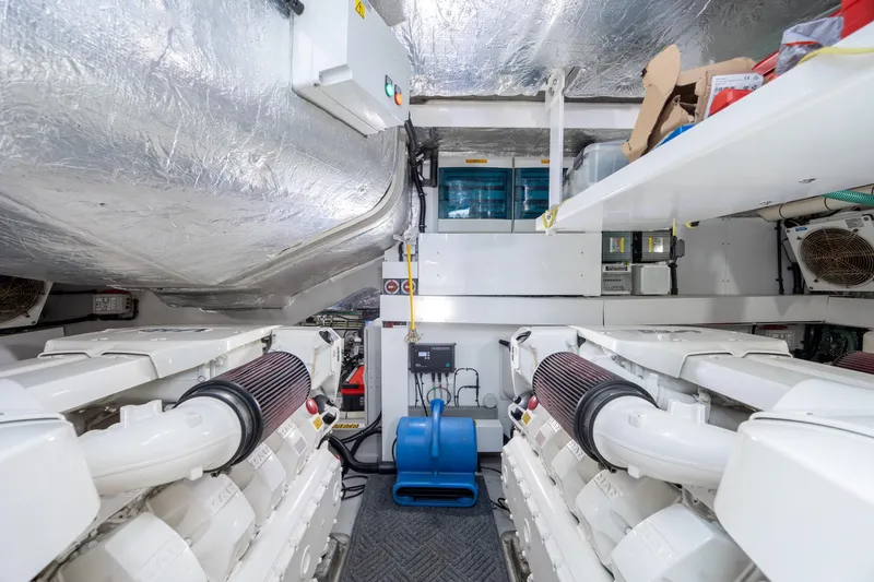Slide: The Image of Engine room of 2020 Sunseeker Predator 74 XPS yacht, featuring advanced machinery and equipment. - 19