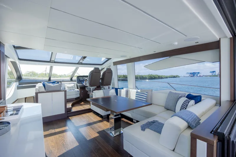 Slide: The Image of Luxurious interior of 2020 Sunseeker Predator 74 XPS yacht with modern seating and panoramic views. - 2