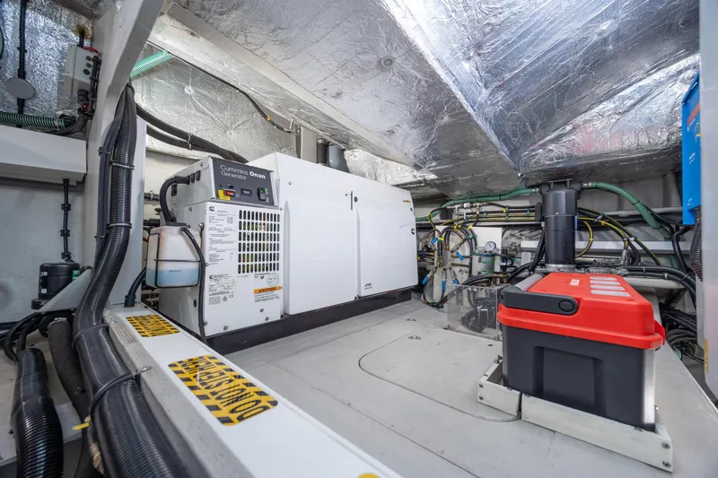 Slide: The Image of Engine room of 2020 Sunseeker Predator 74 XPS yacht with Cummins Onan generator. - 26