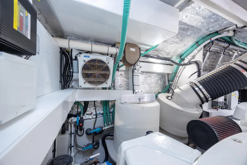 Slide: The Image of Engine room of 2020 Sunseeker Predator 74 XPS yacht, showcasing mechanical components. - 28