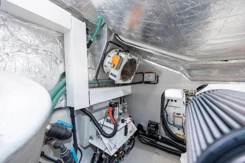 Slide: The Image of Engine room of 2020 Sunseeker Predator 74 XPS yacht, showcasing mechanical components. - 29