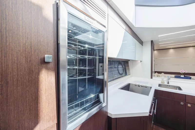 Slide: The Image of Luxurious kitchen interior of 2020 Sunseeker Predator 74 XPS yacht with modern appliances. - 31