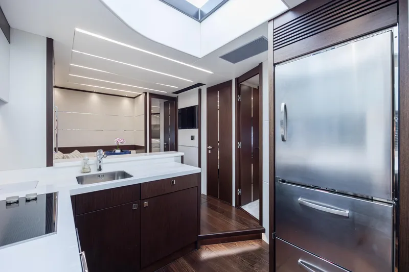 Slide: The Image of Luxurious interior of 2020 Sunseeker Predator 74 XPS yacht kitchen area. - 32