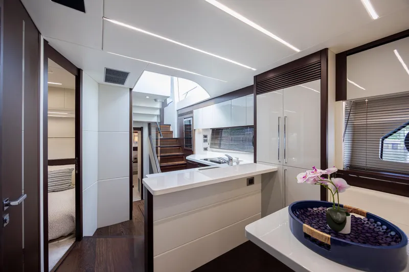 Slide: The Image of Luxurious interior of 2020 Sunseeker Predator 74 XPS yacht with modern kitchen design. - 34
