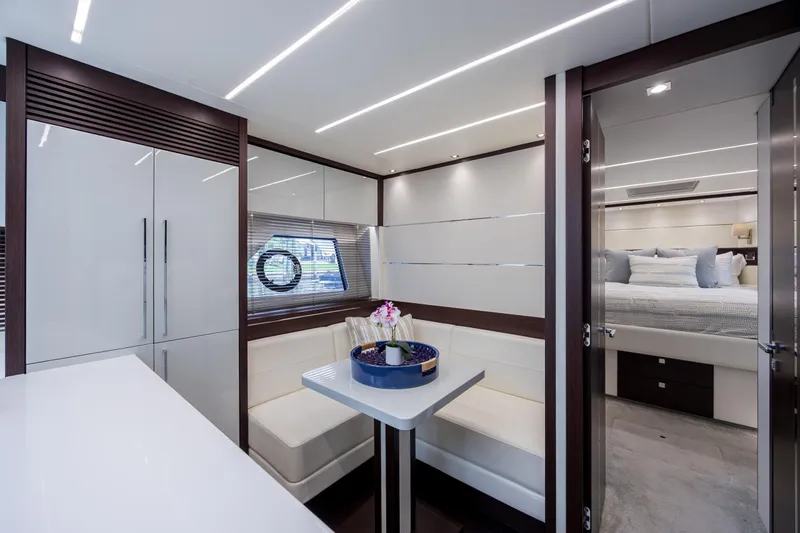 Slide: The Image of Luxurious interior of 2020 Sunseeker Predator 74 XPS yacht with modern dining area and bedroom. - 35