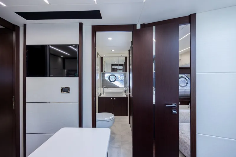 Slide: The Image of Luxurious interior of 2020 Sunseeker Predator 74 XPS yacht, featuring modern bathroom and sleek design. - 37