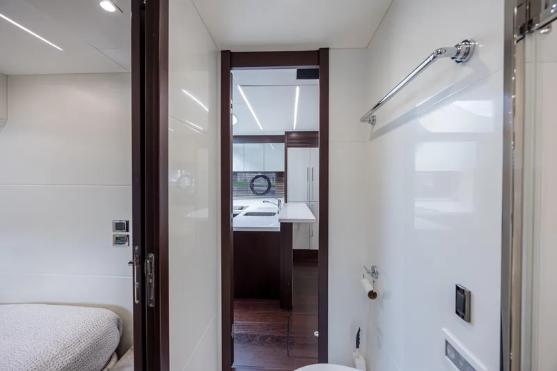 Slide: The Image of Interior of 2020 Sunseeker Predator 74 XPS yacht, featuring modern bathroom and bedroom. - 40
