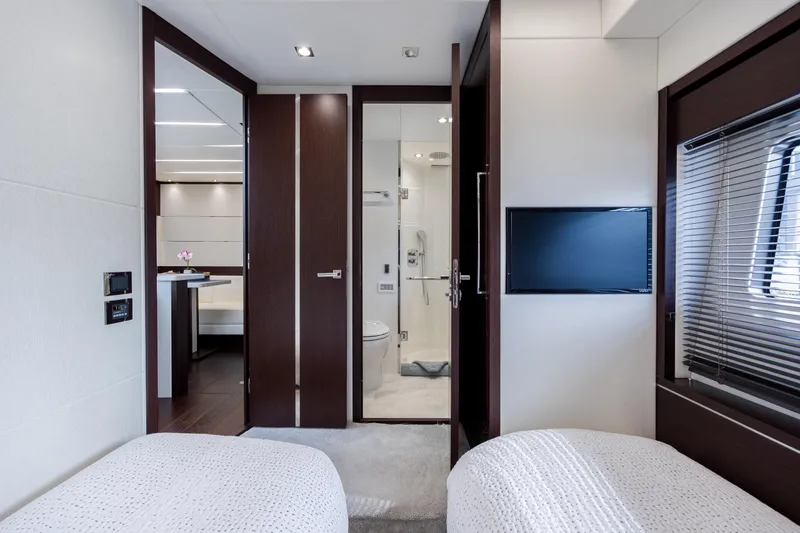 Slide: The Image of Luxurious interior of 2020 Sunseeker Predator 74 XPS yacht cabin with modern amenities. - 42