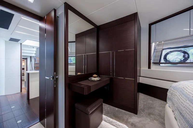 Slide: The Image of Luxurious interior of 2020 Sunseeker Predator 74 XPS yacht cabin with modern furnishings. - 47