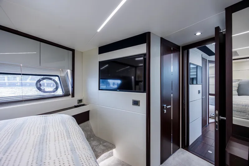 Slide: The Image of Luxurious interior of 2020 Sunseeker Predator 74 XPS yacht bedroom with modern design. - 48