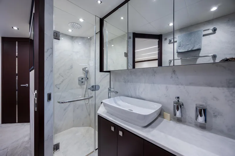 Slide: The Image of Luxurious bathroom in 2020 Sunseeker Predator 74 XPS yacht with marble finishes. - 55