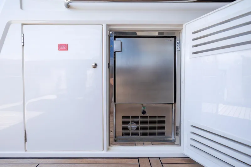 Slide: The Image of Stainless steel refrigerator on 2020 Sunseeker Predator 74 XPS yacht deck. - 71