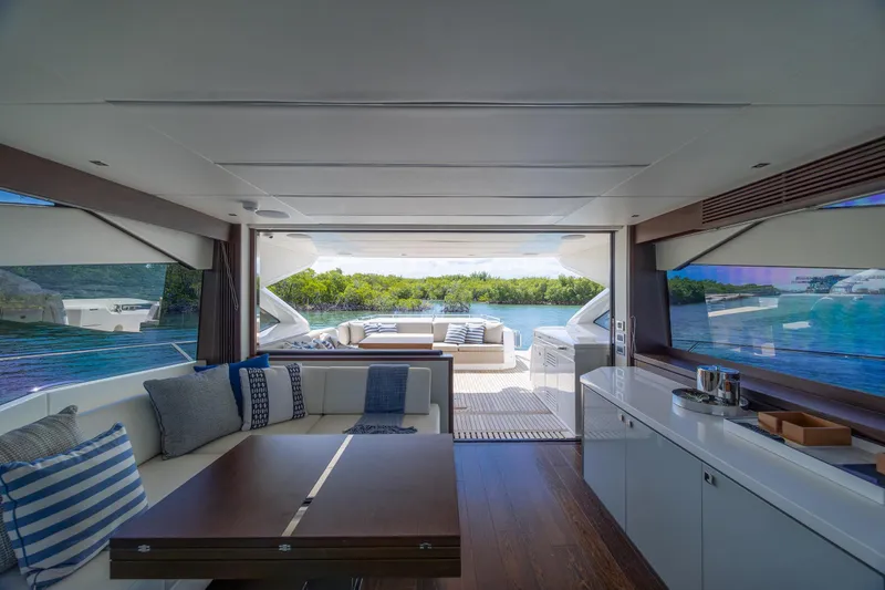 Slide: The Image of Luxurious interior of 2020 Sunseeker Predator 74 XPS yacht with scenic water view. - 77